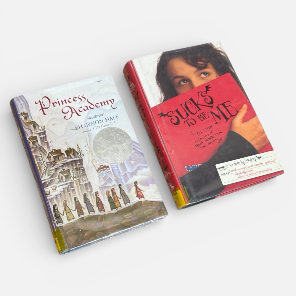 Young Adult Fiction: Princess Academy and Sucks to Be Me Hardcover Books
